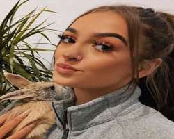 She is an animal lover and loves to cuddle small animals like a bunny.
